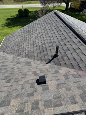 New roof, crisp ridge line — TNE Roofing & Siding